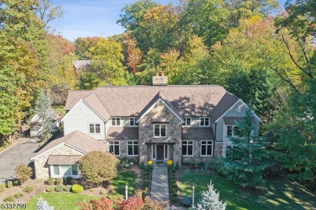 exterior space featuring a front lawn