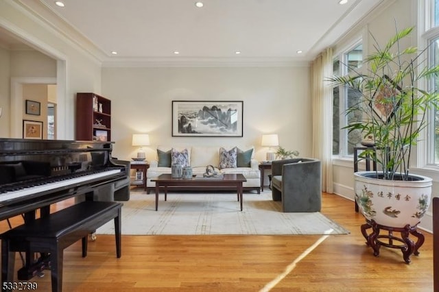 interior space with wood-type flooring and crown molding