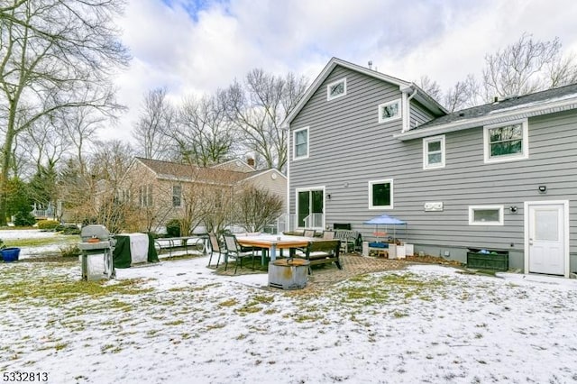 view of snow covered property