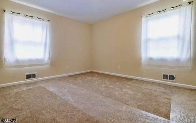 empty room with carpet floors