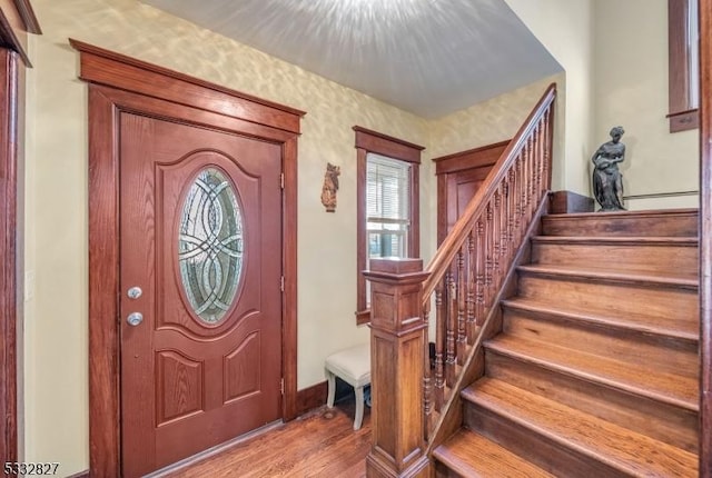 entryway with light hardwood / wood-style flooring