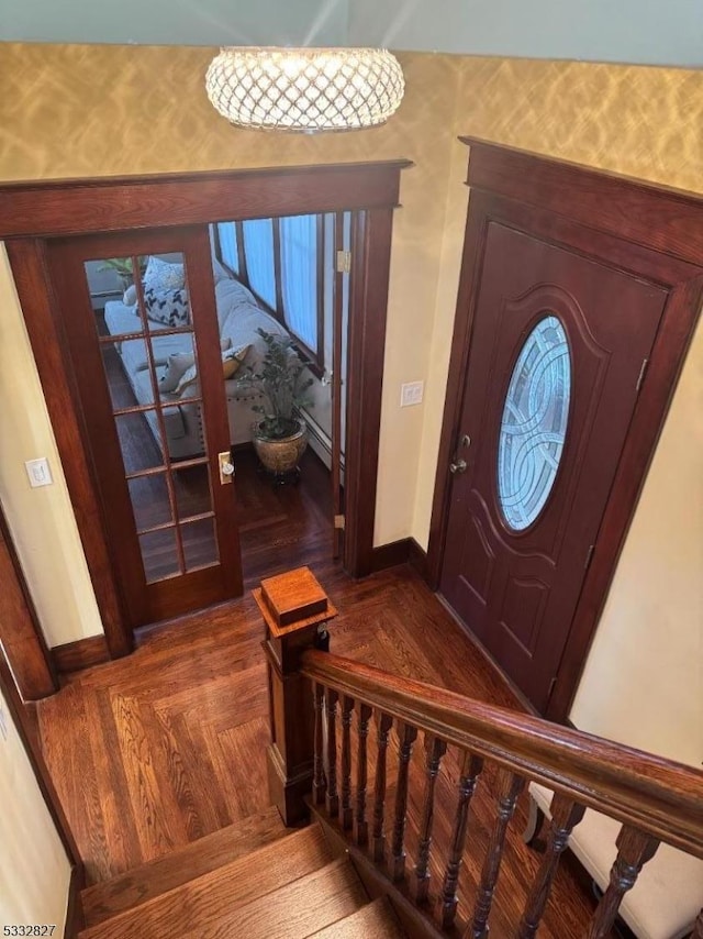 foyer entrance with parquet floors