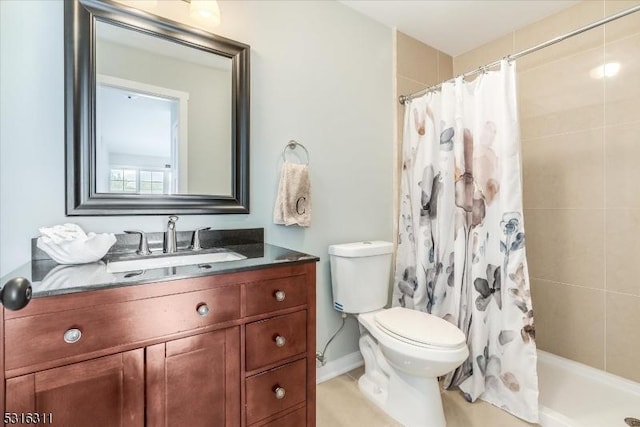 bathroom with a shower with curtain, toilet, and vanity