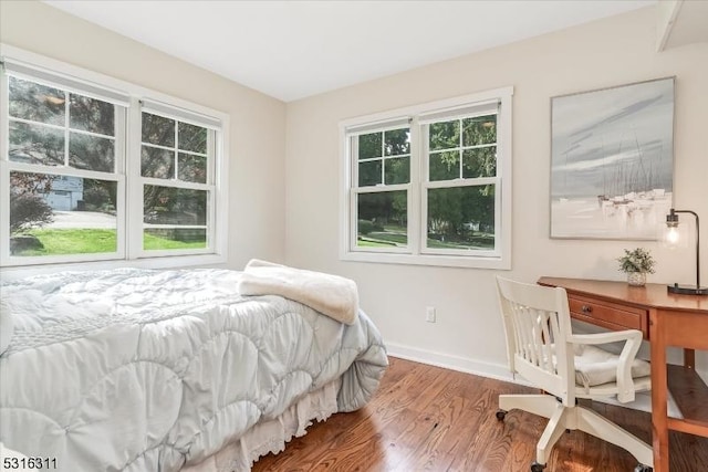 bedroom with hardwood / wood-style floors