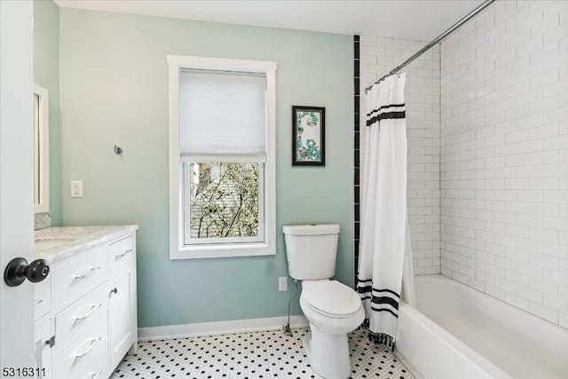 full bathroom with toilet, vanity, and shower / bath combo with shower curtain