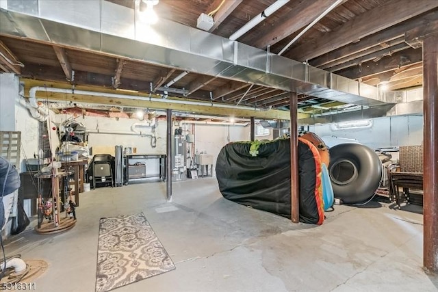 basement featuring gas water heater