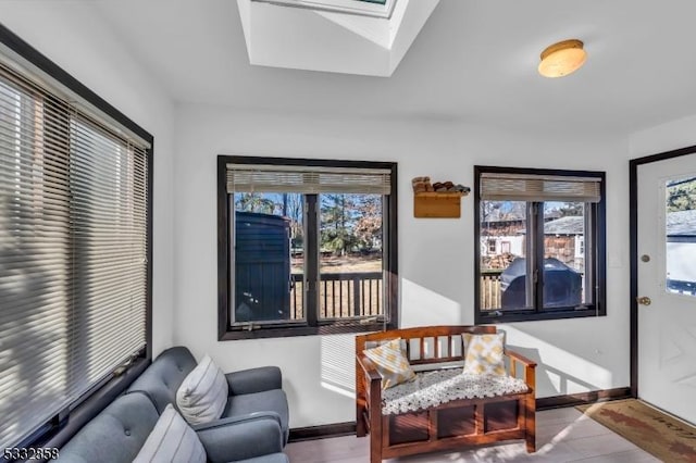 sitting room featuring a skylight