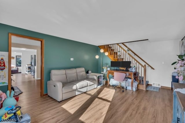 living room with wood-type flooring