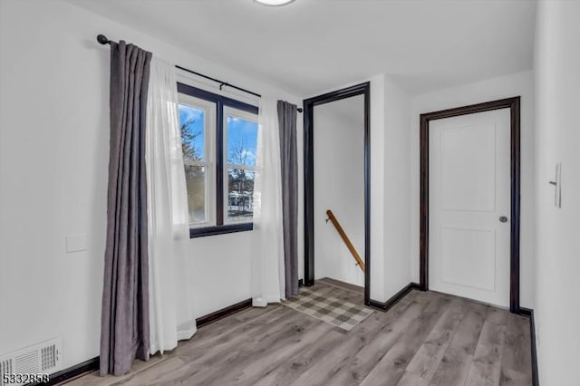 empty room featuring light wood-type flooring