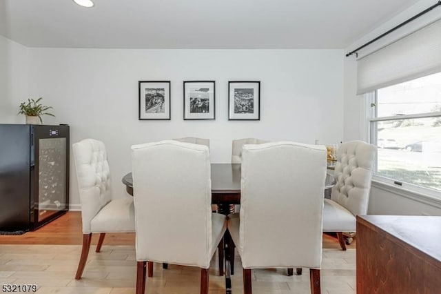 dining room with light hardwood / wood-style floors