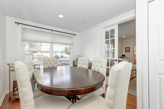 dining area featuring wood-type flooring