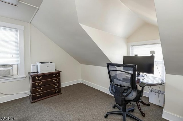 office featuring lofted ceiling and dark carpet