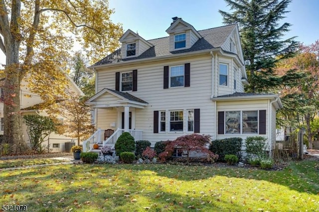 view of front of home with a front yard