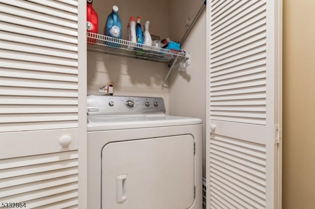 washroom featuring washer / dryer