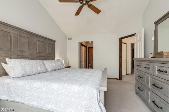 bedroom featuring light carpet, ceiling fan, and high vaulted ceiling