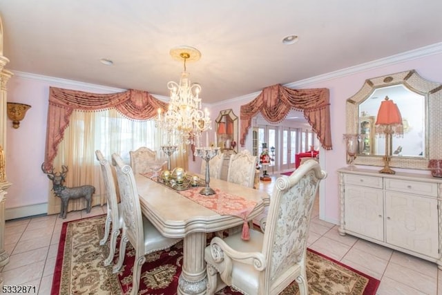 tiled dining area with an inviting chandelier, baseboard heating, and crown molding