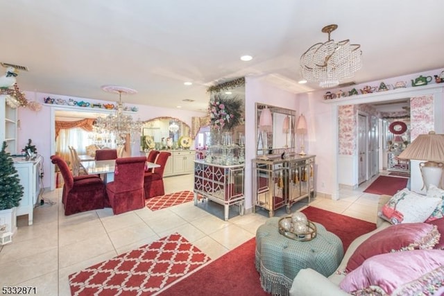 tiled living room with an inviting chandelier