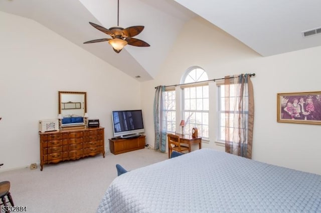 bedroom with ceiling fan, light carpet, and lofted ceiling