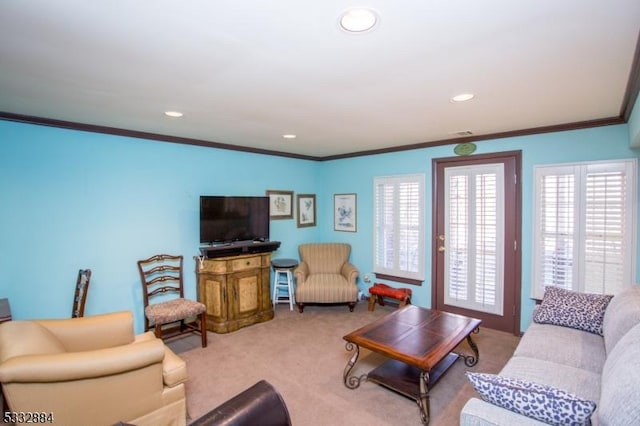 carpeted living room featuring crown molding