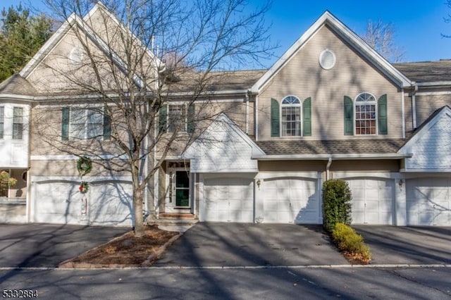 front facade with a garage