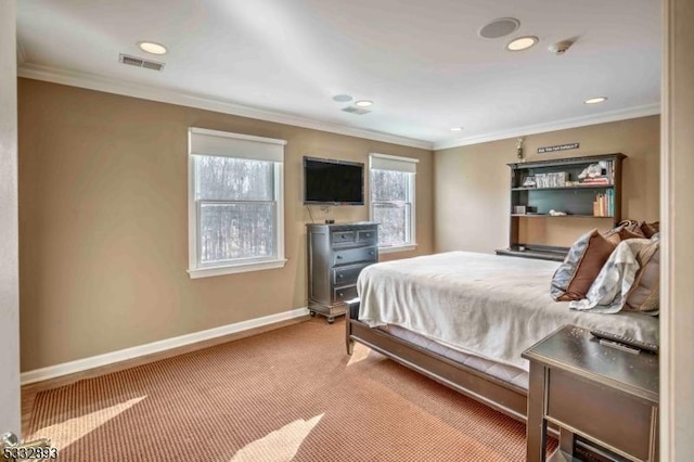 carpeted bedroom featuring crown molding