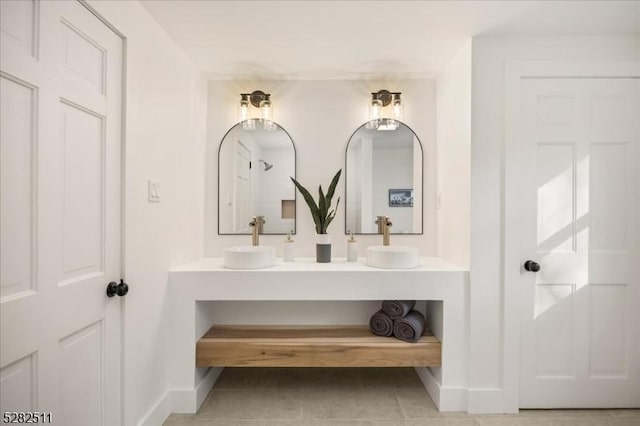 bathroom featuring vanity and tile patterned flooring