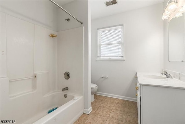 full bathroom featuring bathtub / shower combination, toilet, vanity, and tile patterned flooring