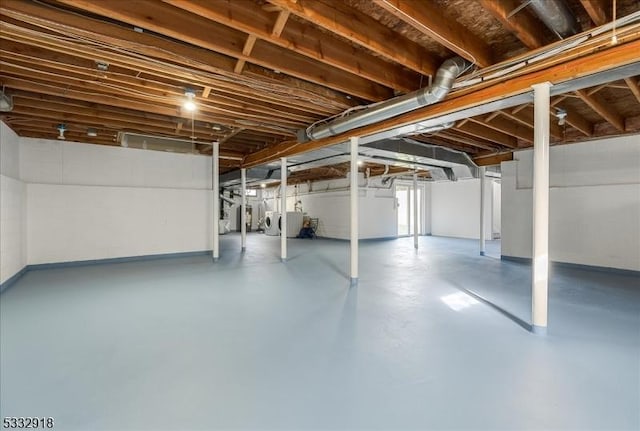 basement featuring washing machine and dryer