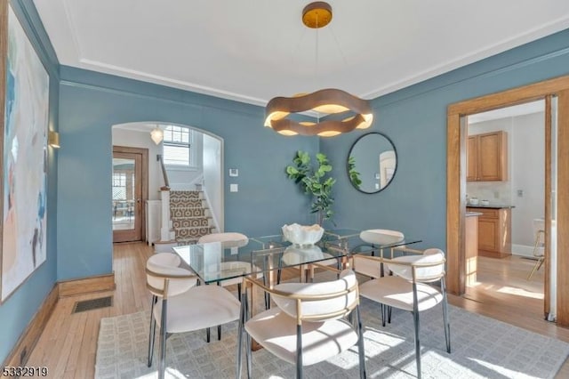 dining room featuring light hardwood / wood-style floors