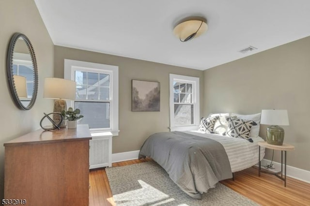 bedroom featuring light hardwood / wood-style floors