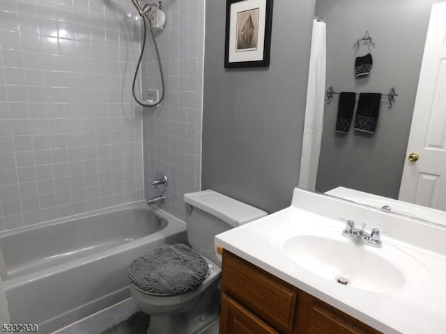 bathroom featuring vanity, toilet, and shower / tub combo with curtain