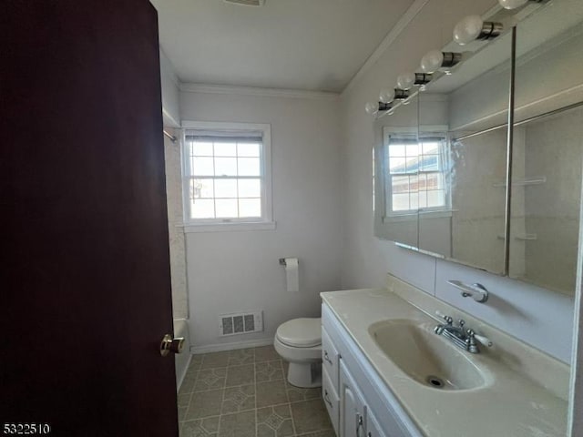 full bathroom featuring toilet, washtub / shower combination, tile patterned floors, ornamental molding, and vanity