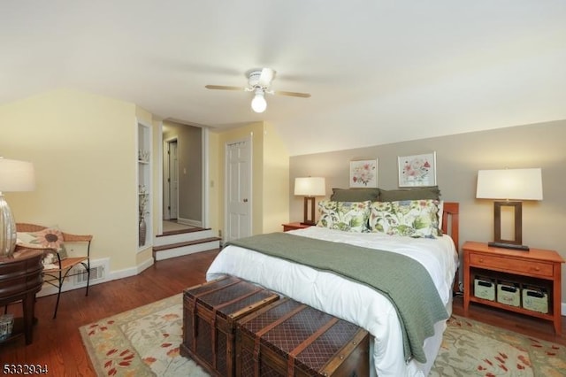 bedroom featuring ceiling fan and dark hardwood / wood-style flooring