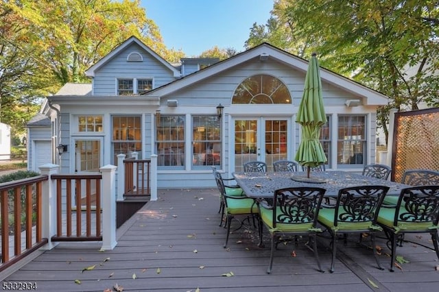 rear view of house with a deck