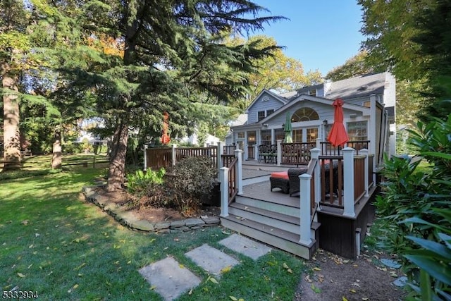 view of yard with a wooden deck