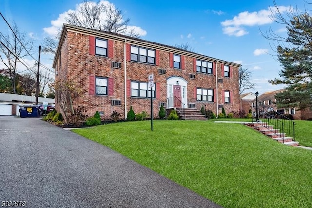 view of front of house with a front lawn