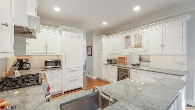 kitchen with sink and white cabinetry