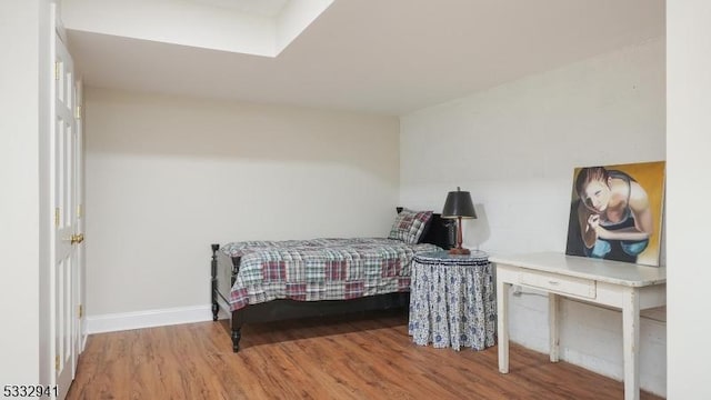 bedroom with light hardwood / wood-style flooring