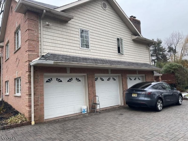 view of home's exterior featuring a garage