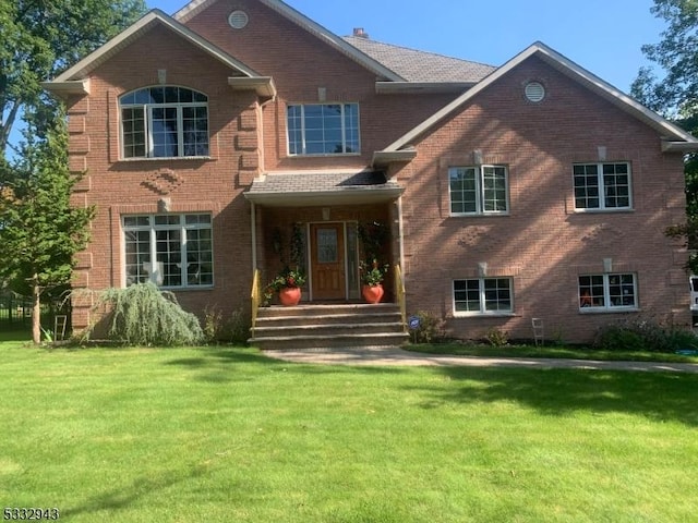 view of front of home with a front yard