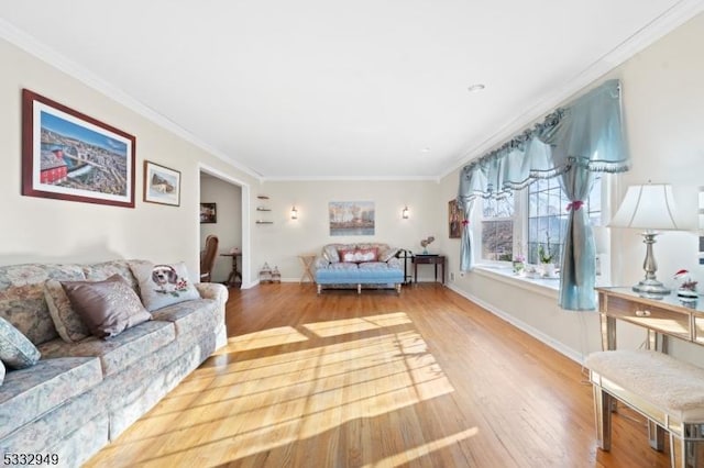 bedroom featuring ornamental molding and hardwood / wood-style floors