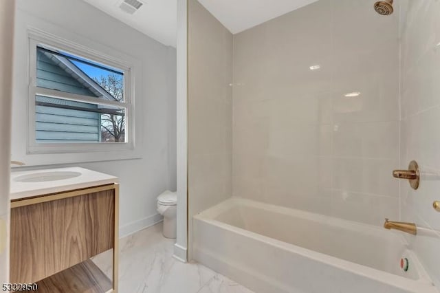 full bathroom featuring toilet, bathtub / shower combination, and vanity