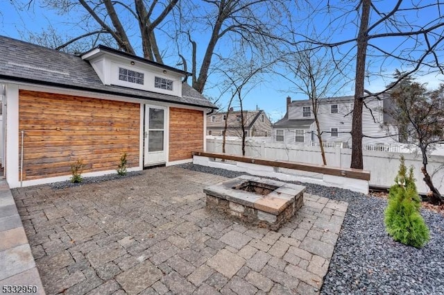 view of patio / terrace with an outdoor fire pit