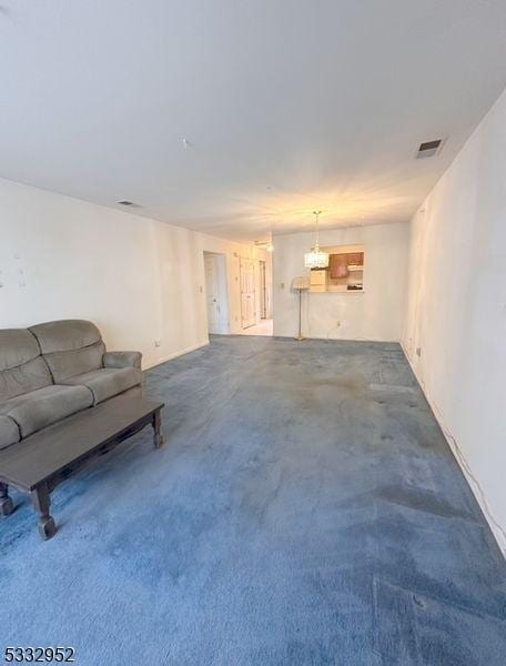 unfurnished living room with carpet floors