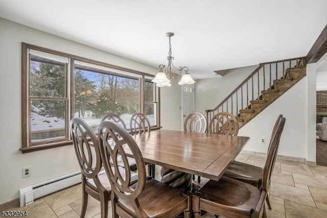 dining area with a notable chandelier and a baseboard radiator