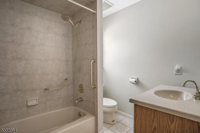 full bathroom with tiled shower / bath combo, tile patterned floors, vanity, and toilet