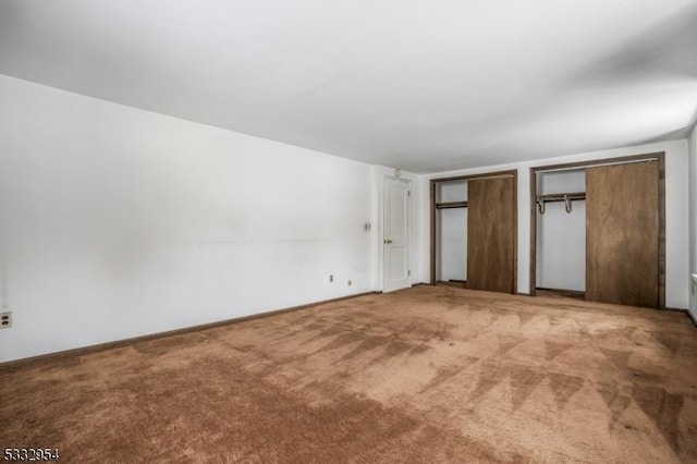 unfurnished bedroom featuring carpet flooring