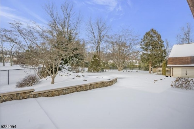 view of yard covered in snow