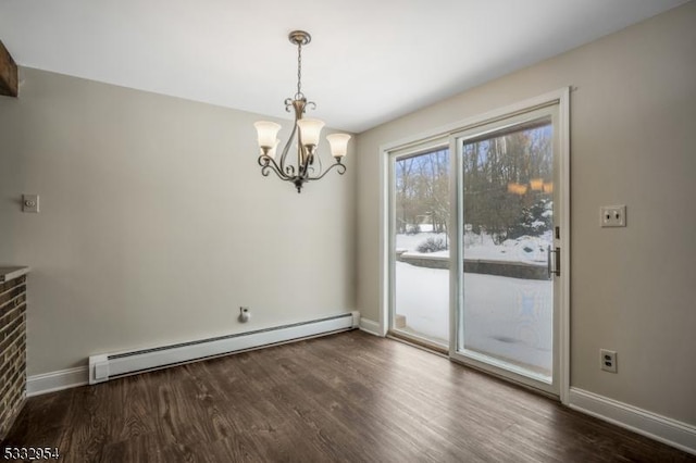 unfurnished dining area with an inviting chandelier, dark hardwood / wood-style floors, and a baseboard heating unit