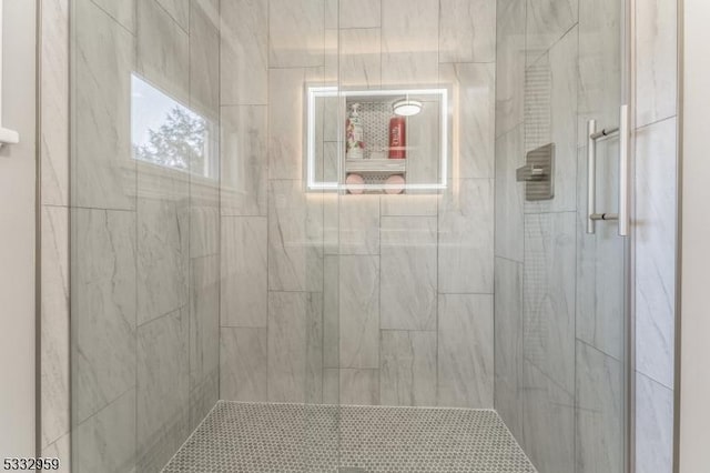 bathroom featuring walk in shower